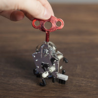 Механическая искрящаяся заводная игрушка Ping Ling-2