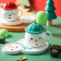 Кружка с блюдцем Снеговик зеленый